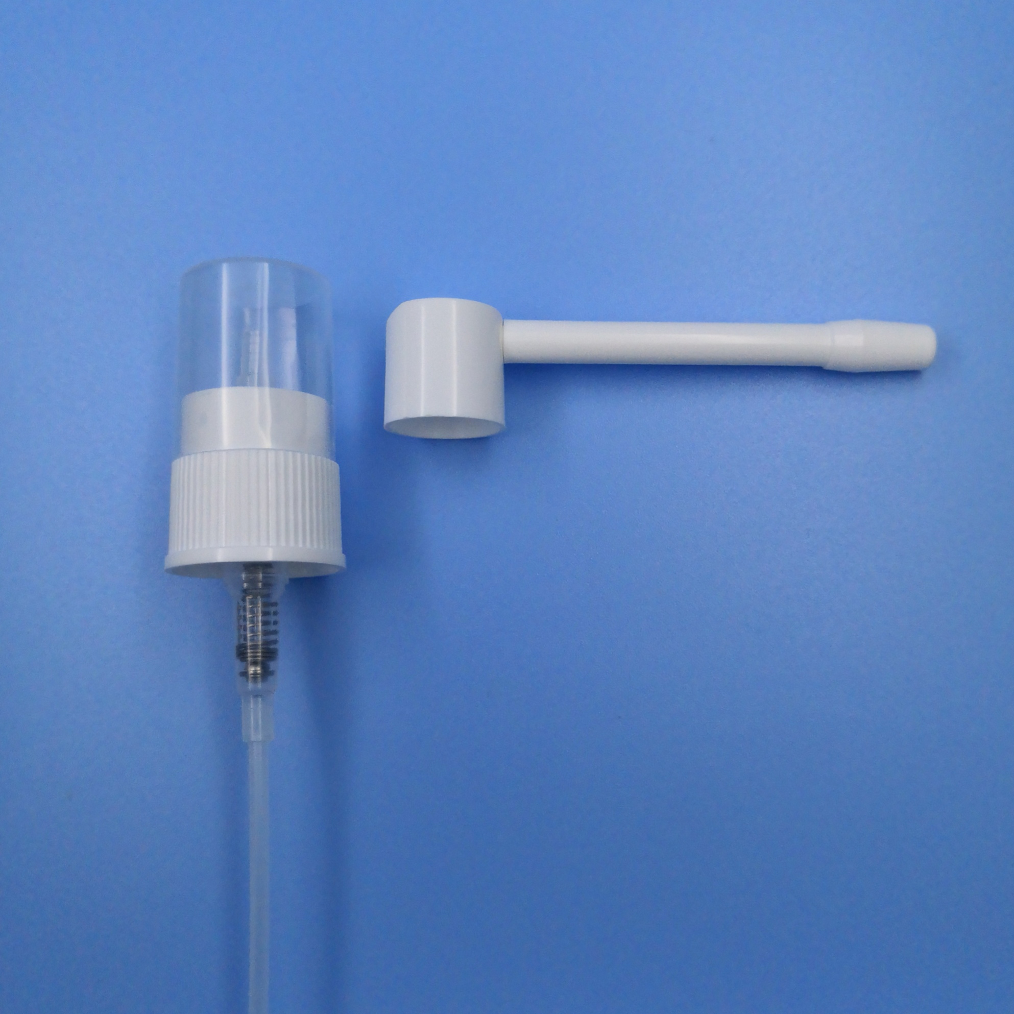 Throat spray pump with fixed long nozzle, Meter dosed